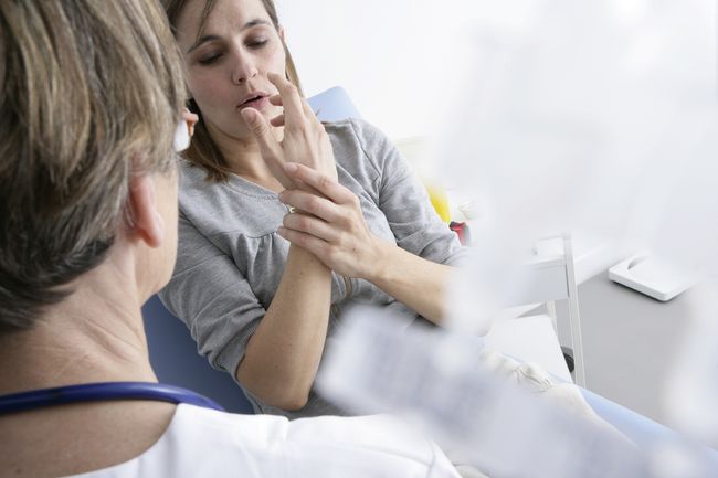 WOMAN AT HOSPITAL CONSULTATION